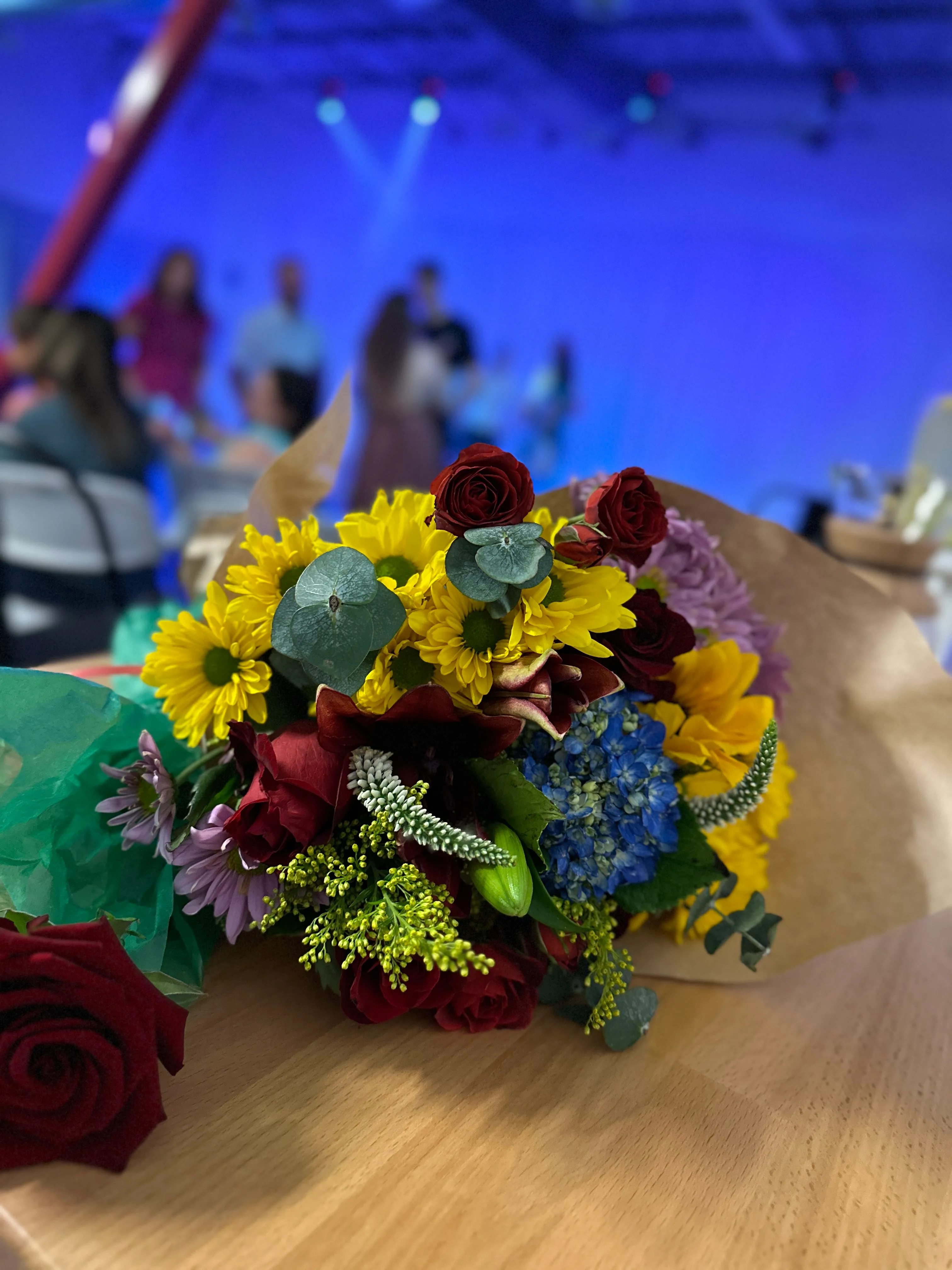 A bouquet of flowers in the foreground.